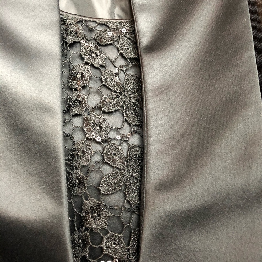 Elegant black suit with lace accents